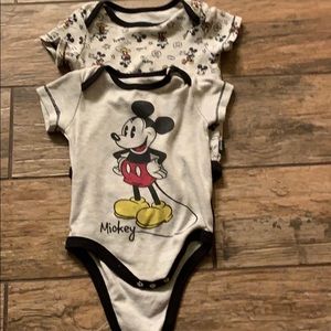 Two Mickey onesies
